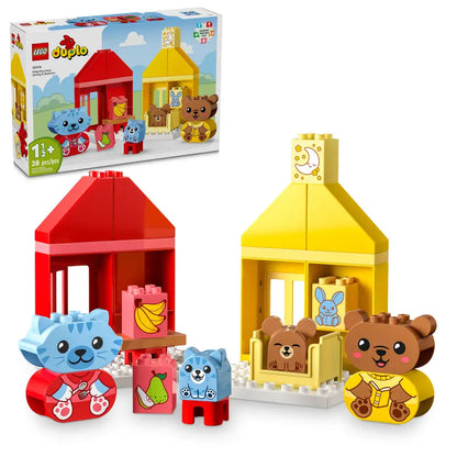 LEGO Duplo toy set with colorful houses and animals on a white background